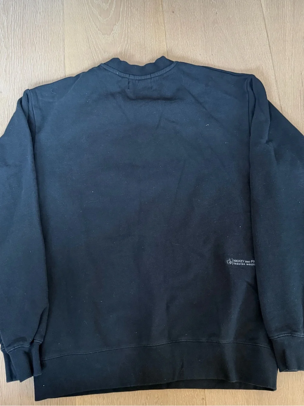Disney Black Crewneck with Red-Accented Mickey Graphic